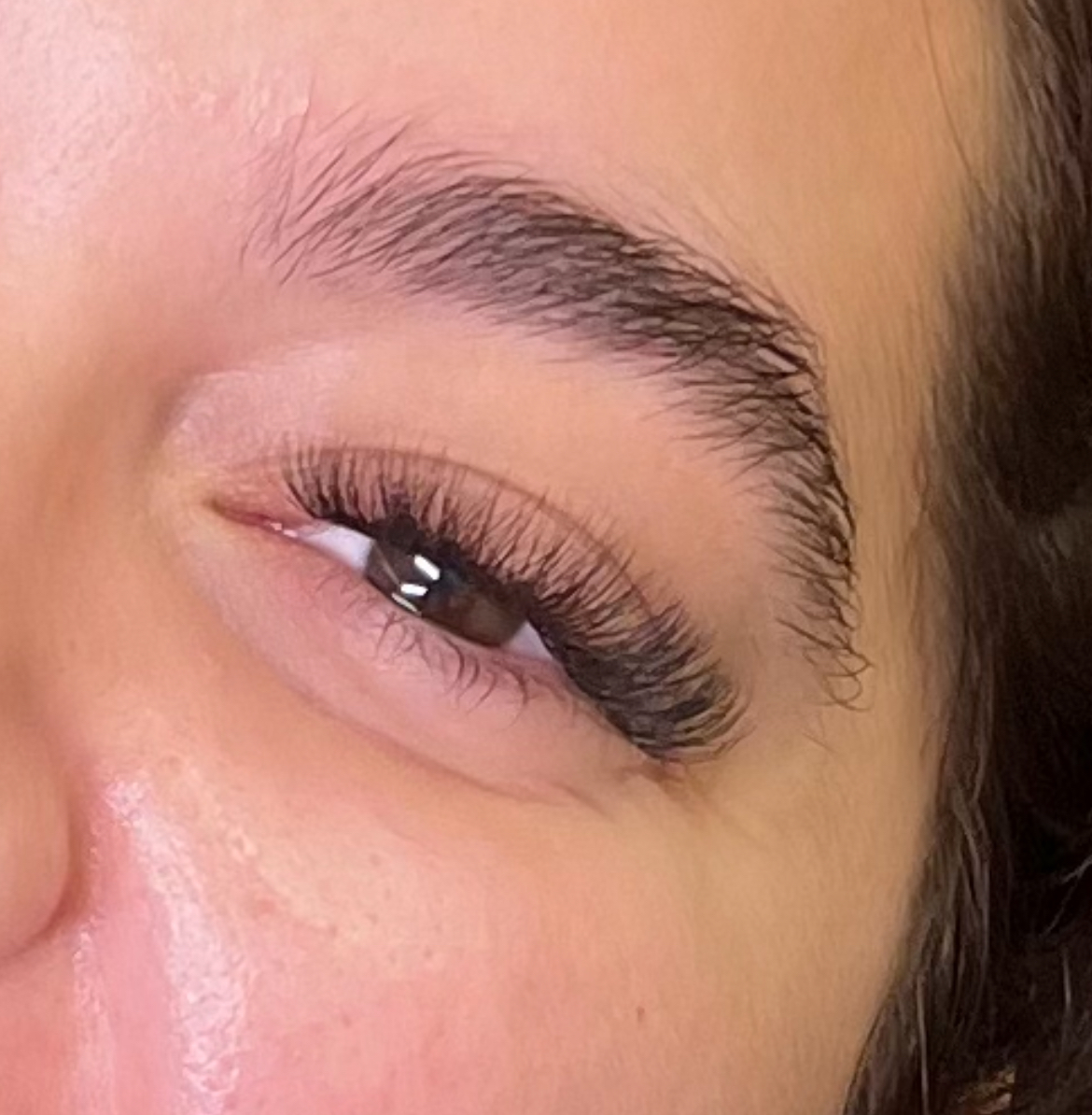 wispy lash extensions and shaped brow