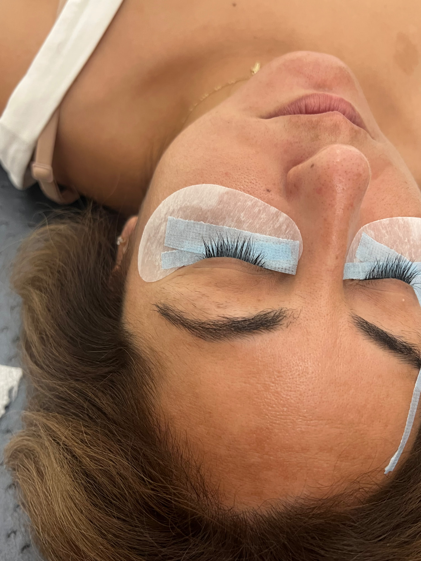 Before — natural lashes → lifted + tinted