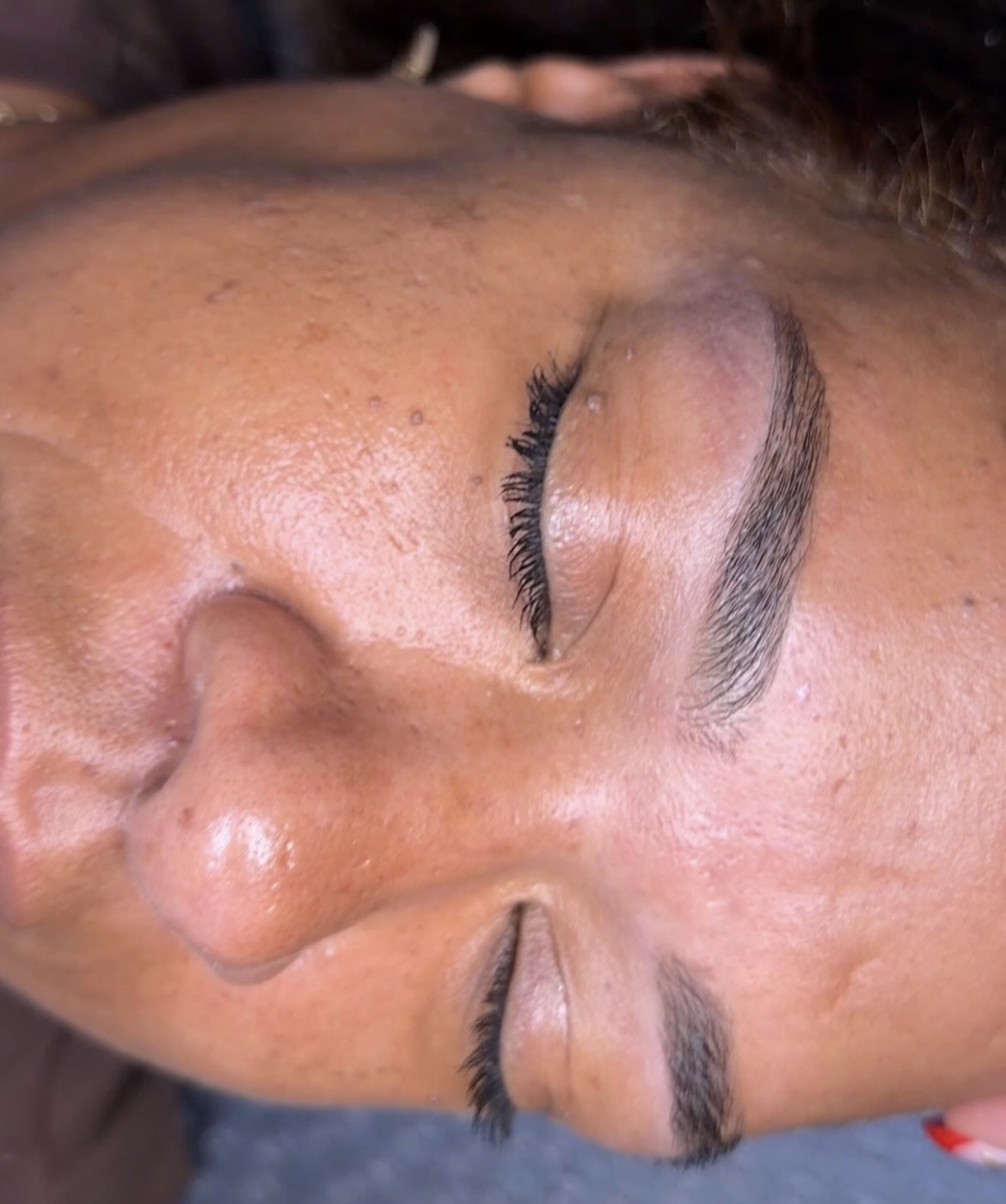 brow shaping and lash detail close up